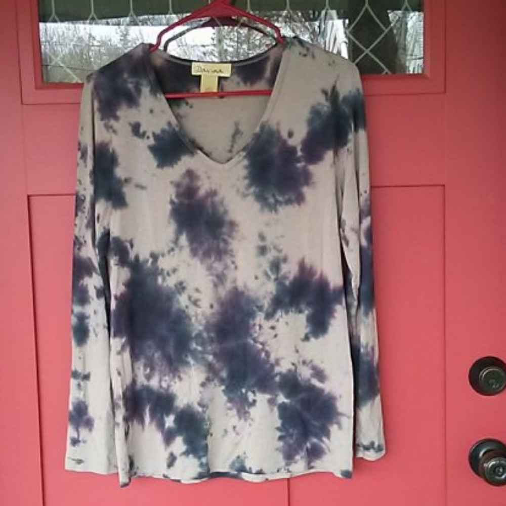 Long sleeve top.  Modal, polyester, spandex blend.